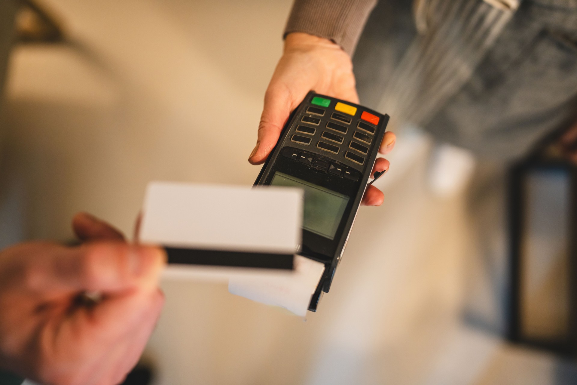 Credit card payment machine in use during a business transaction